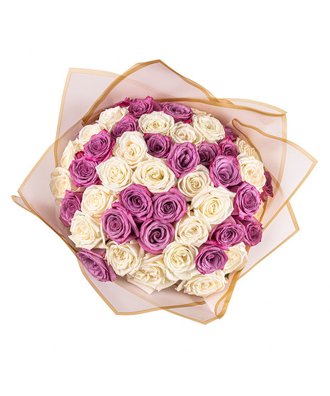 A Ramo Buchón with 25 lavender and 25 white roses, hand-tied with tissue paper.